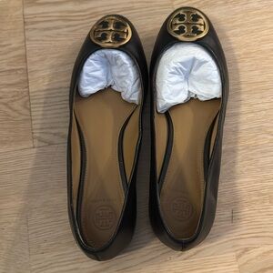 Black classic Tory Burch flats. Never worn.